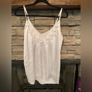 White camisole. Satin feel.‎ Lace front